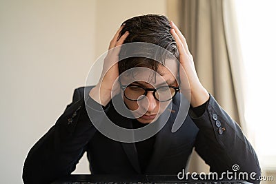 portrait of stressed business man in the office. bad awful negative news got fired from work. Dismissal notice Stock Photo