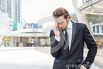 Portrait stressed sad business man outdoors Stock Photo