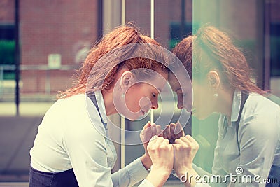 Portrait stressed sad young woman outdoors. Urban life style stress Stock Photo