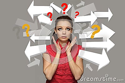 Portrait of a stressed teen girl with question marks Stock Photo