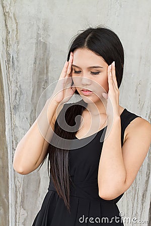 Portrait of stressed woman with a headache, stress, migraine Stock Photo