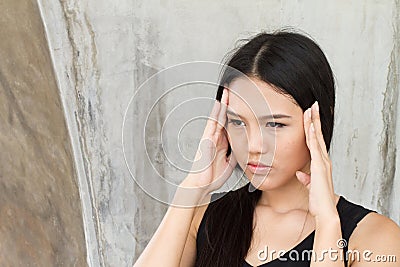 Portrait of stressed woman with a headache, stress, migraine Stock Photo