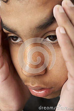 Portrait Of Stressed Young Boy Stock Photo