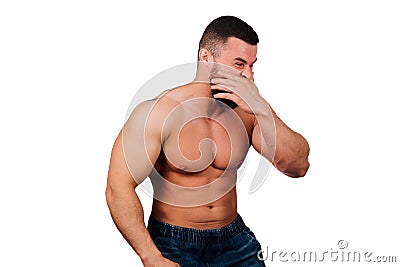 Portrait of a strong bearded male fitness model, torso. White background, isolate. hands on his hips. Stock Photo