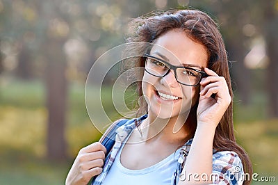 Portrait of the student girl in the park Stock Photo