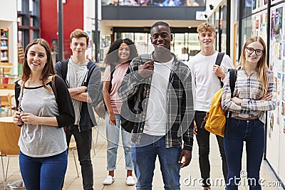 Portrait Of Student Group In Communal Area Of Busy College Stock Photo