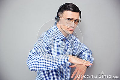 Portrait of a stylish man in glasses and headphones Stock Photo