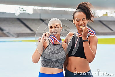 Portrait, success medals and women at stadium after winning running race or sports event outdoors. Fitness, winner and Stock Photo