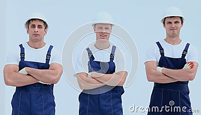 Successful team builders in overalls and helmets Stock Photo