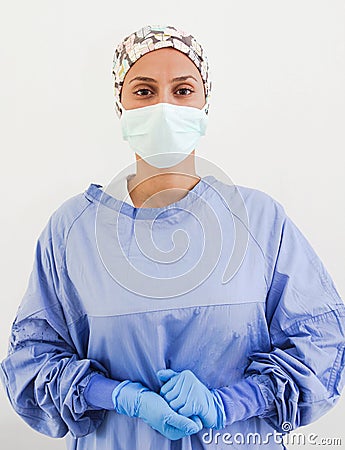 Portrait of a surgeon with gloves and a mask Stock Photo