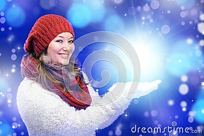 Portrait of a sweet girl with a red scarf Christmas, close-up Stock Photo