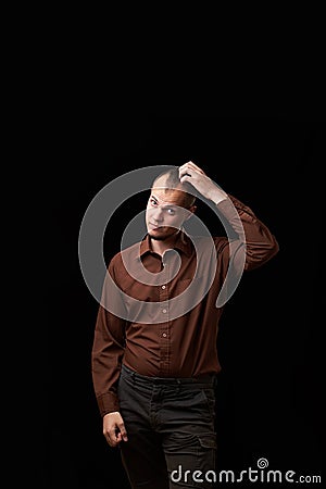 Portrait of a sympathetic emotional guy. Studio portrait of young handsome sympathetic man Stock Photo