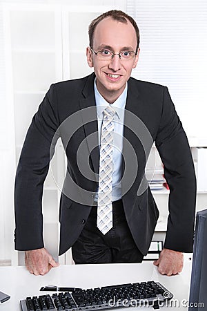 Portrait of a sympathetic manager in his office Stock Photo