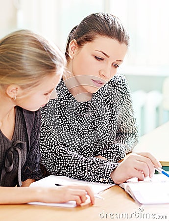 Portrait of a teacher explaining something Stock Photo