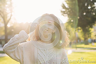 Portrait of teen girl with maple leaf Stock Photo