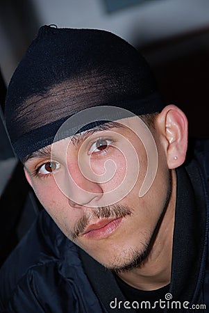 Portrait of a Teenage Boy From The Hood Stock Photo