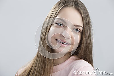 Portrait of Teenage Female Having Teeth Brackets Stock Photo