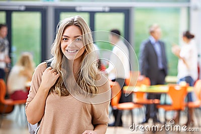 Portrait Of Teenage Female Student In Classroom Stock Photo