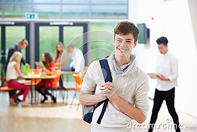 Portrait Of Teenage Male Student In Classroom Stock Photo