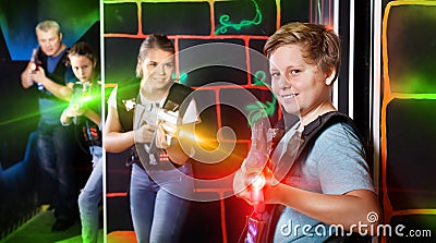 Teenager boy with laser gun on lasertag arena Stock Photo