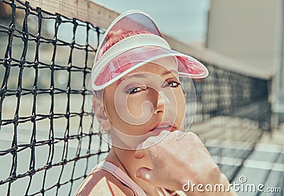 Portrait, tennis and woman with confidence, exercise and training outdoor, sunshine and fitness. Face, player and female Stock Photo