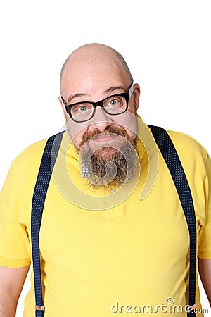 Portrait of a thick funny middle-aged man in bright yellow cloth Stock Photo