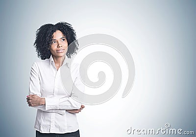 Pensive African American businesswoman, gray Stock Photo