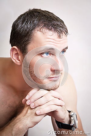 Portrait of thoughtful attractive man close up Stock Photo
