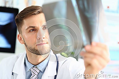 Doctor looking for sciagram Stock Photo