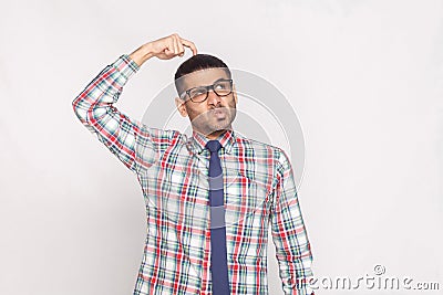 Portrait of thoughtful handsome bearded businessman in colorful Stock Photo