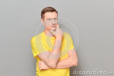 Portrait of thoughtful mature man with focused serious expression Stock Photo