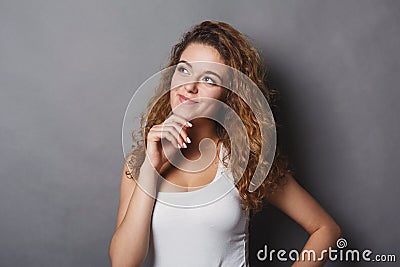 Portrait of thoughtful woman with mysterious look Stock Photo