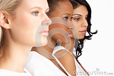 Portrait Of Three Attractive Young Women In Studio Stock Photo