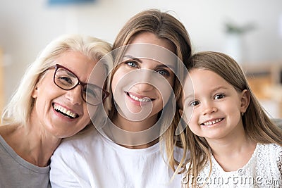 Portrait of three generations family, grandmother, grown daughte Stock Photo