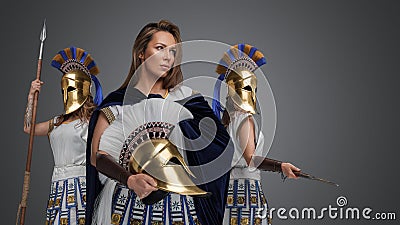 Female warlord and two warriors women from ancient greece Stock Photo