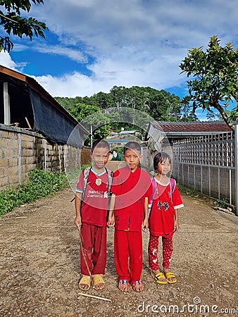 Portrait of three local children in Ban Rak Thai, A Chinese Settlement In Mae Hong Son, Thailand Editorial Stock Photo