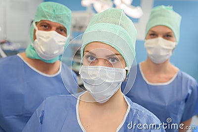 Portrait three masked medical workers Stock Photo