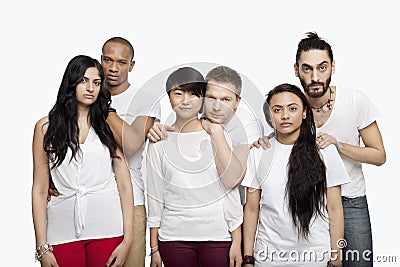 Portrait three young couples standing together over white background Stock Photo