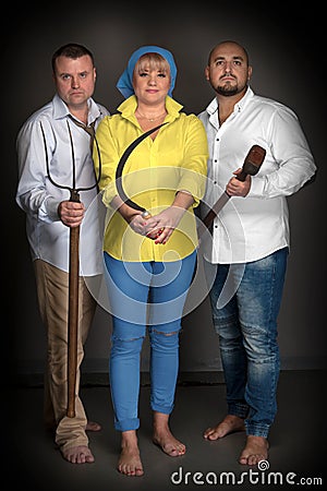 Portrait of three young Ukrainians defenders Stock Photo