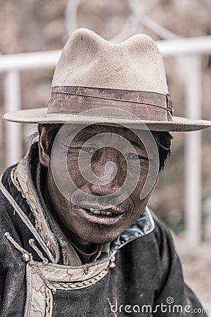 Portrait of a Tibetan man smiling Editorial Stock Photo