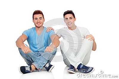 Portrait of two brothers sitting Stock Photo