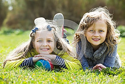 Portrait of two cute girls with ball Stock Photo