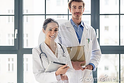 Portrait of two determined physicians looking at camera in a mod Stock Photo