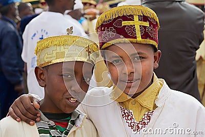 Portrait of two Ethiopian boys wearing traditional costumes during Timkat Christian Orthodox religious celebrations i Editorial Stock Photo