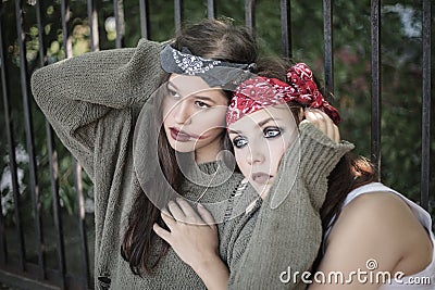 Portrait of two girls outdoors. The concept of difficult teenagers, bad students Stock Photo