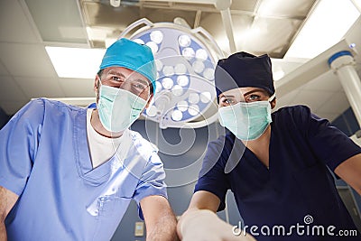 Portrait of two surgeons over the operating table Stock Photo