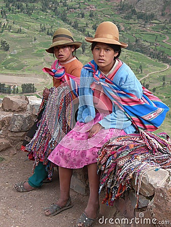 Portrait of two young girls dressed in traditional clothing Editorial Stock Photo