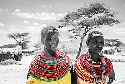 Portrait of two young maasai girls with traditional jewelery and clothing in a native village in Samburu Editorial Stock Photo