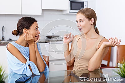 Friends having expressional talking Stock Photo