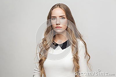 Portrait unhappy long haired beautiful girl Stock Photo